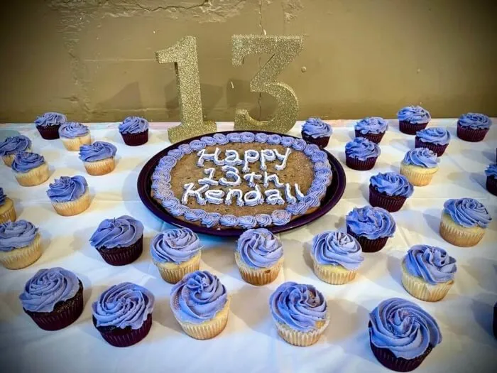 Signature chocolate chip cookie cake with purple rosette piping for a 13th birthday in Peebles Ohio